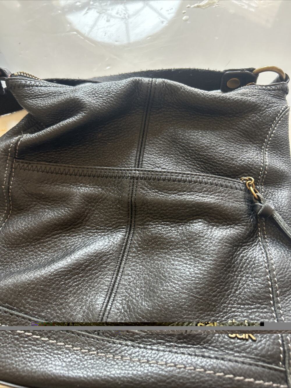 The Sak Black Leather Crossbody Bag Front Zip Pocket Adjustable Strap